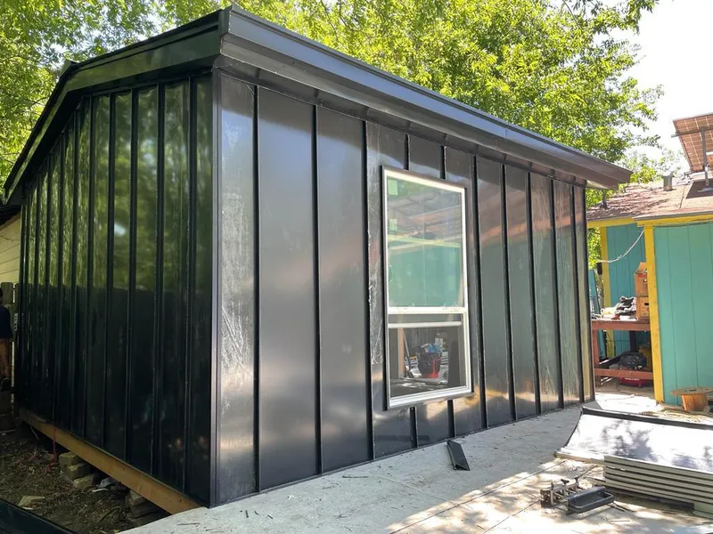 Black standing seam metal wall panels for Roof Inspection in Colebrookdale