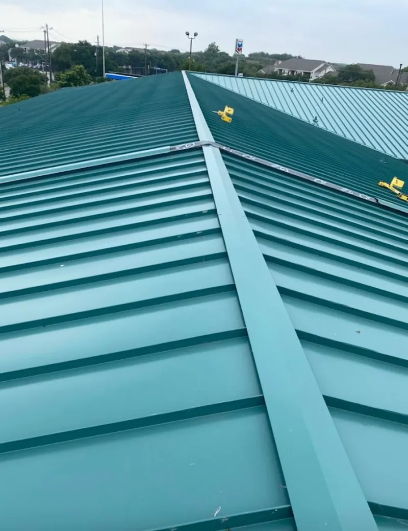 Green commercial metal roof ridge and valley for Metal Roof Repair in Colebrookdale